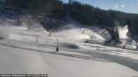 Archiv Foto Webcam Kanzelhöhe: Schirmbar und Sonnenarena 13:00