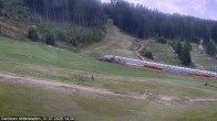 Archiv Foto Webcam Kanzelhöhe: Schirmbar und Sonnenarena 13:00