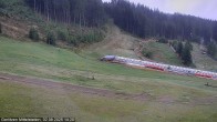 Archiv Foto Webcam Kanzelhöhe: Schirmbar und Sonnenarena 13:00