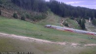 Archiv Foto Webcam Kanzelhöhe: Schirmbar und Sonnenarena 12:00