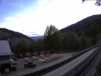Archived image Webcam Schneeberg: View mountain restaurant Baumgartner 19:00
