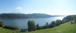 Archiv Foto Webcam Wallersee: Blick auf Neumarkt die Ostbucht 13:00