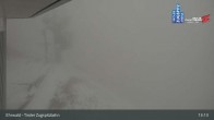 Archived image Webcam Tiroler Zugspitzbahn Top Station 12:00