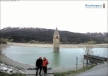 Archived image Webcam Lake Resia and the symbol of Venosta Valley 11:00