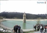 Archived image Webcam Lake Resia and the symbol of Venosta Valley 11:00