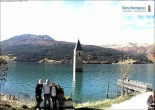 Archived image Webcam Lake Resia and the symbol of Venosta Valley 11:00