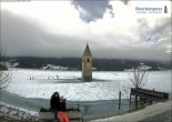 Archived image Webcam Lake Resia and the symbol of Venosta Valley 11:00