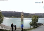 Archived image Webcam Lake Resia and the symbol of Venosta Valley 11:00