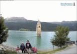 Archived image Webcam Lake Resia and the symbol of Venosta Valley 09:00