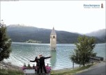 Archived image Webcam Lake Resia and the symbol of Venosta Valley 19:00