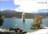 Archived image Webcam Lake Resia and the symbol of Venosta Valley 11:00
