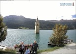 Archived image Webcam Lake Resia and the symbol of Venosta Valley 13:00