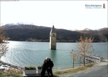 Archived image Webcam Lake Resia and the symbol of Venosta Valley 13:00