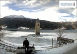 Archived image Webcam Lake Resia and the symbol of Venosta Valley 06:00