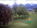 Archived image Webcam Ramsau am Dachstein: Golf course at the hotel Kobaldhof 13:00