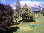 Archived image Webcam Ramsau am Dachstein: Golf course at the hotel Kobaldhof 13:00