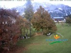 Archived image Webcam Ramsau am Dachstein: Golf course at the hotel Kobaldhof 13:00