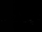Archived image Webcam Disentis/Mustér, Sogn Gions church 23:00