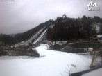 Archived image Webcam Winterberg: View to Ski Jumping Hill from Quick Jet 07:00