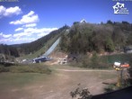 Archived image Webcam Winterberg: View to Ski Jumping Hill from Quick Jet 13:00