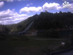 Archived image Webcam Winterberg: View to Ski Jumping Hill from Quick Jet 13:00