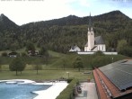 Archiv Foto Webcam Kreuth: Kirche und Freibad 13:00