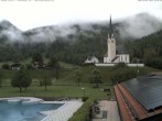 Archiv Foto Webcam Kreuth: Kirche und Freibad 08:00