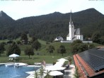 Archiv Foto Webcam Kreuth: Kirche und Freibad 12:00