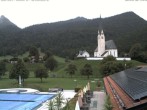 Archiv Foto Webcam Kreuth: Kirche und Freibad 12:00