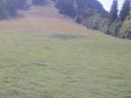 Archived image Webcam Spieserlifte Unterjoch View of the ski run 13:00